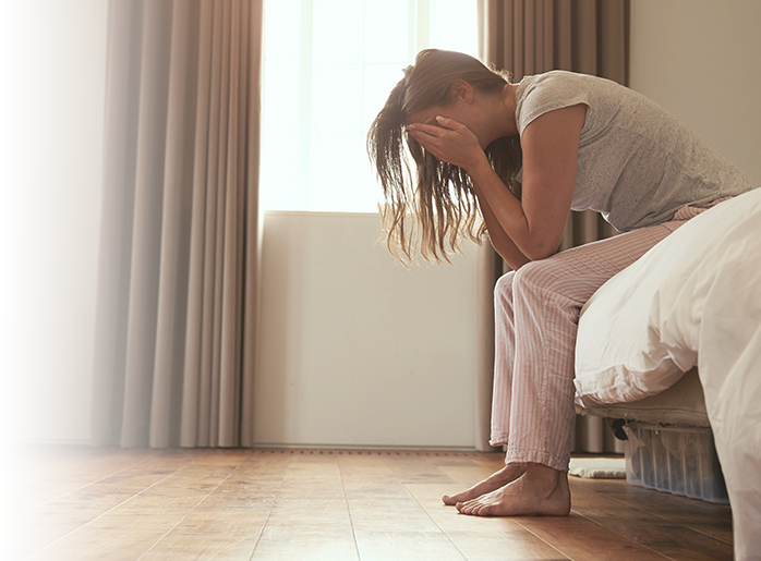 Woman struggling to sleep