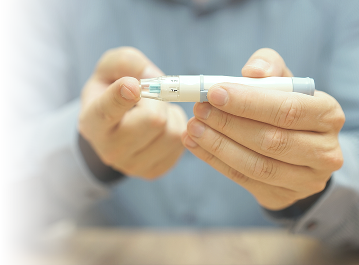 Person testing blood sugar