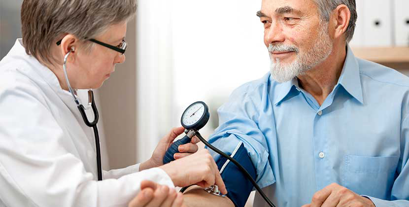 Man getting blood pressure checked